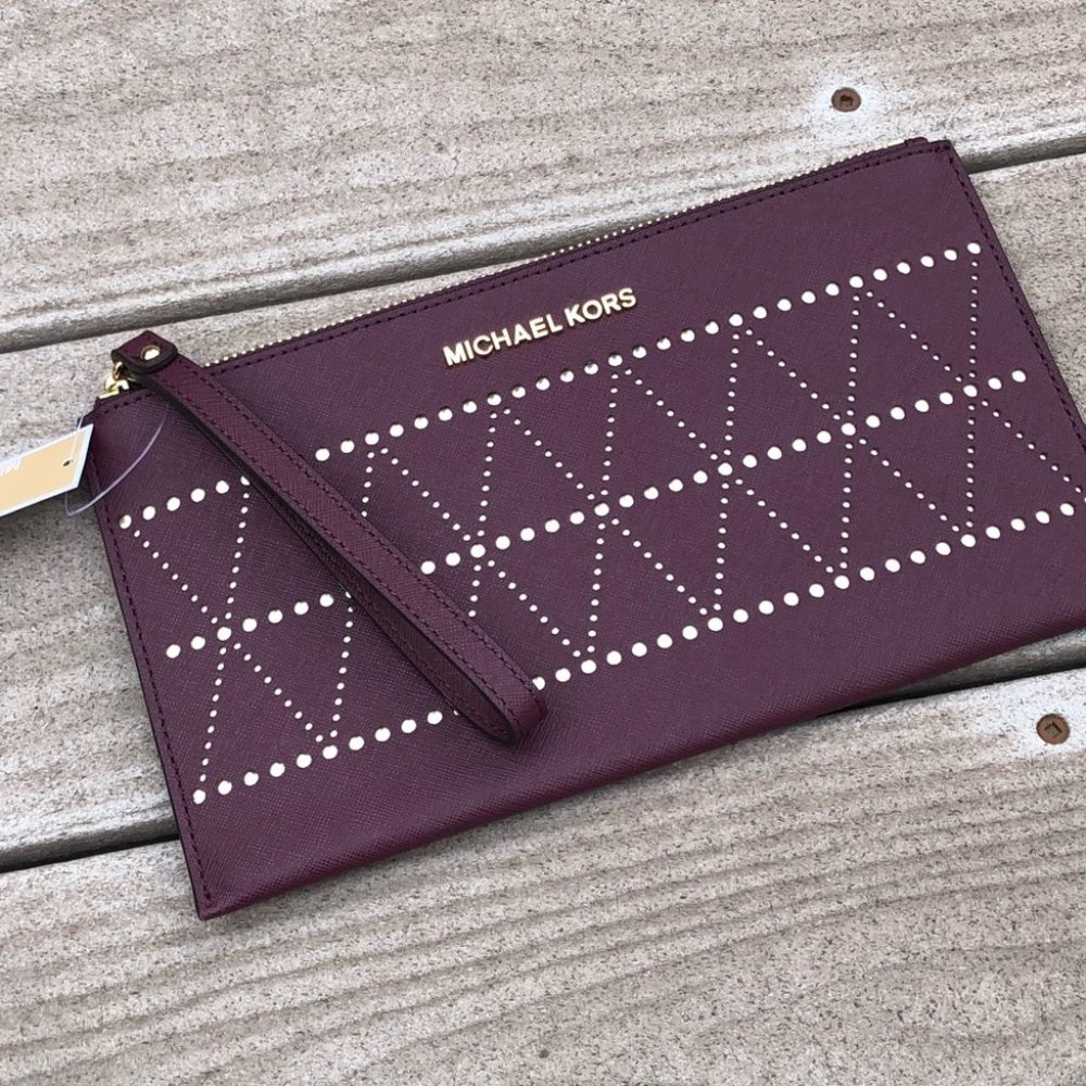 Authentic NWT Michael Kors perforated wristlet - Picture 1 of 6